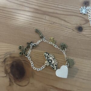 Moth kindle charm