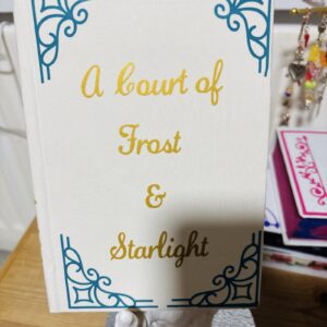Sarah J. Maas White & Blue A Court of Frost & Starlight Hardcover Book